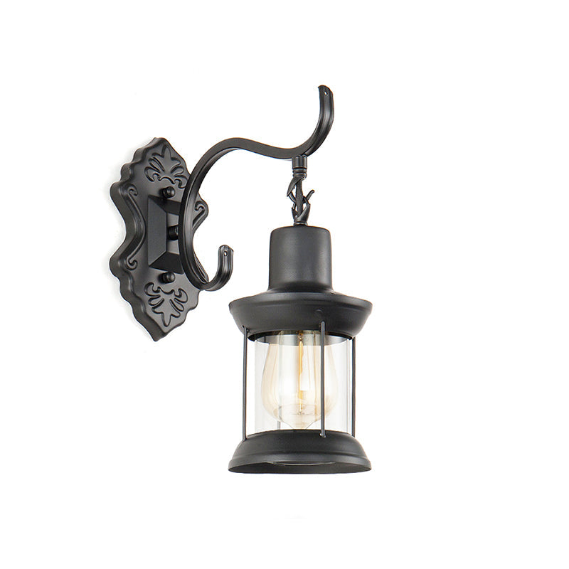 Rynx | Lantern Clear Glass Wall Mounted Lamp Vintage Single Bulb Outdoor Wall Light in Black with Carved Pattern