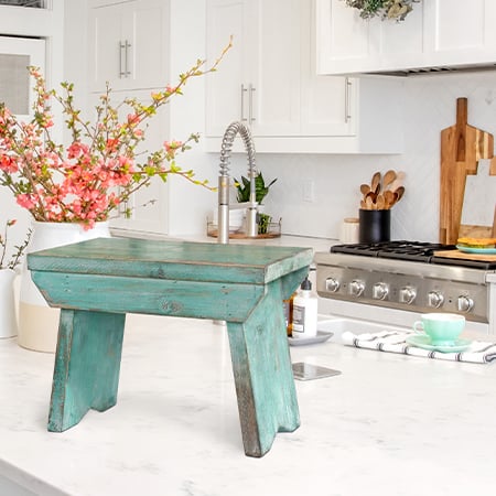 Rynx | Sage Green Distressed Wood Riser Stool
