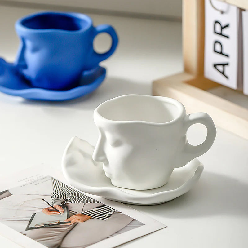 Rynx | Metal touching face, creative ceramic kiss coffee mug