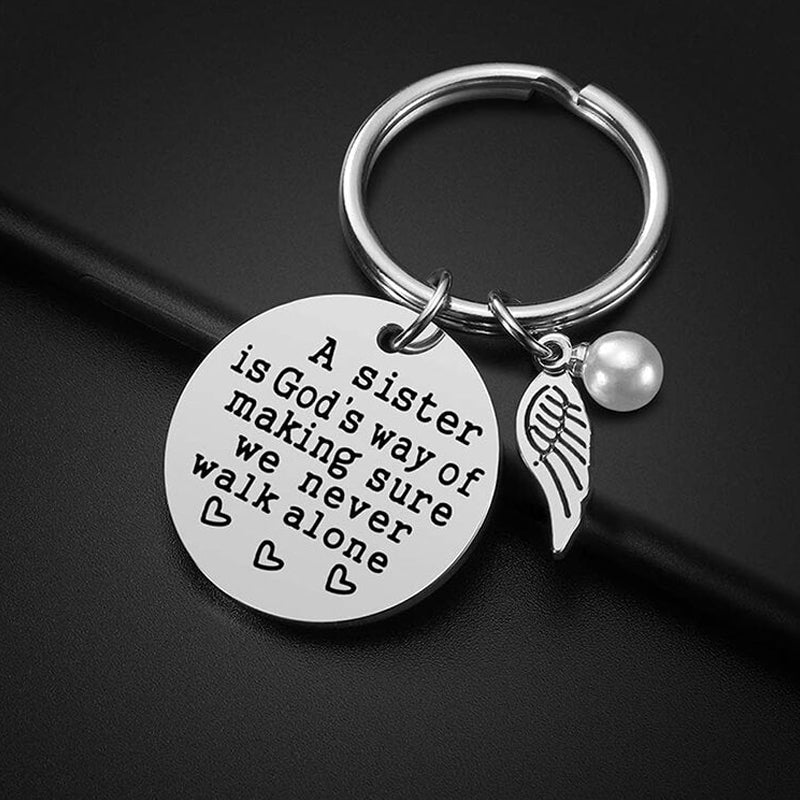 Rynx | A sister is God's way of ensuring that we never walk alone keychain