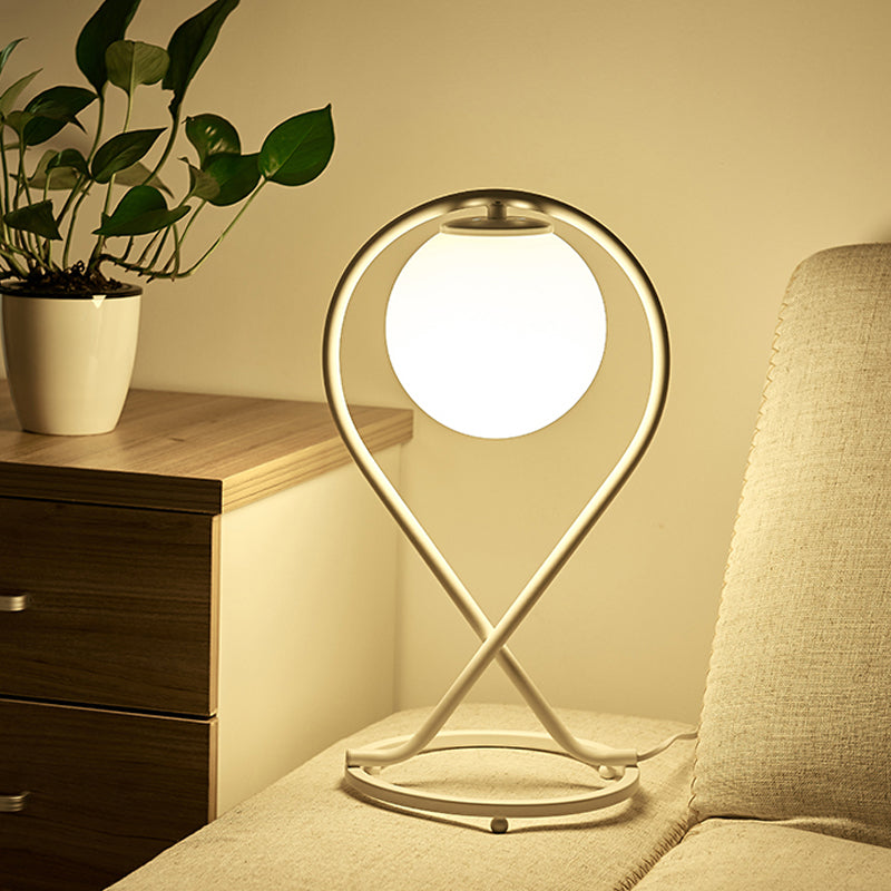 Rynx | Crosstique – modern linear bedside light made of iron