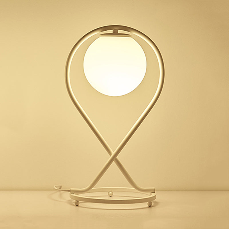 Rynx | Crosstique – modern linear bedside light made of iron