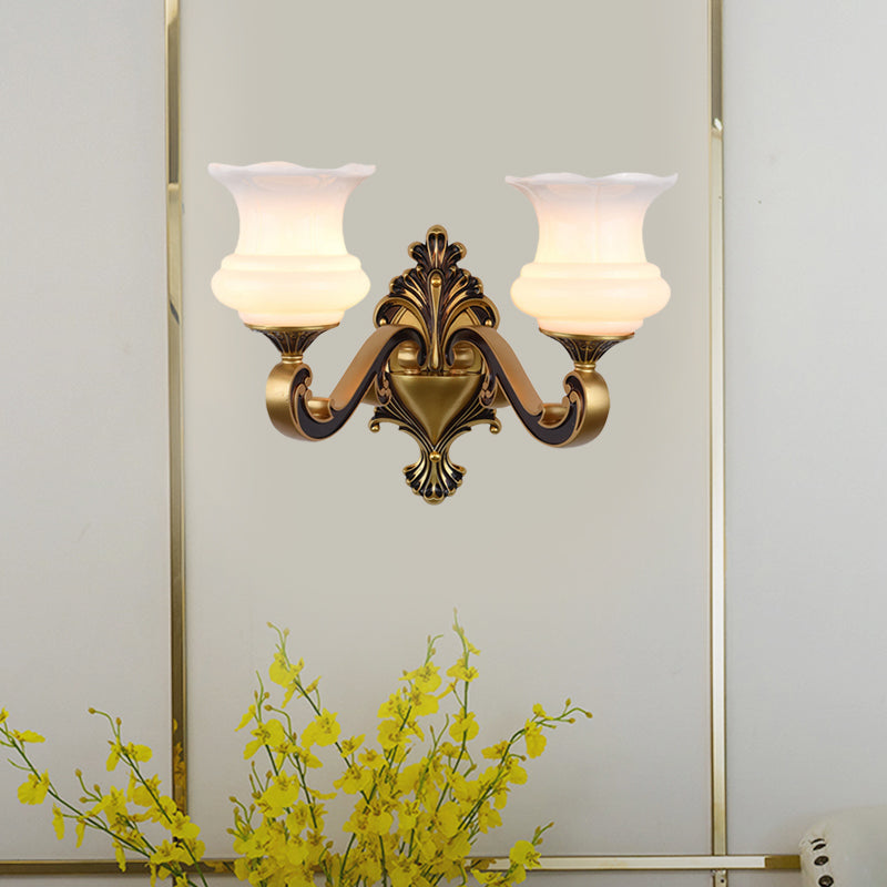 Rynx | Vintage Curved Arm Wall Lighting Idea 1/2-Ball Metal Wall Lamp in Brass with Floral Milk Glass Shade