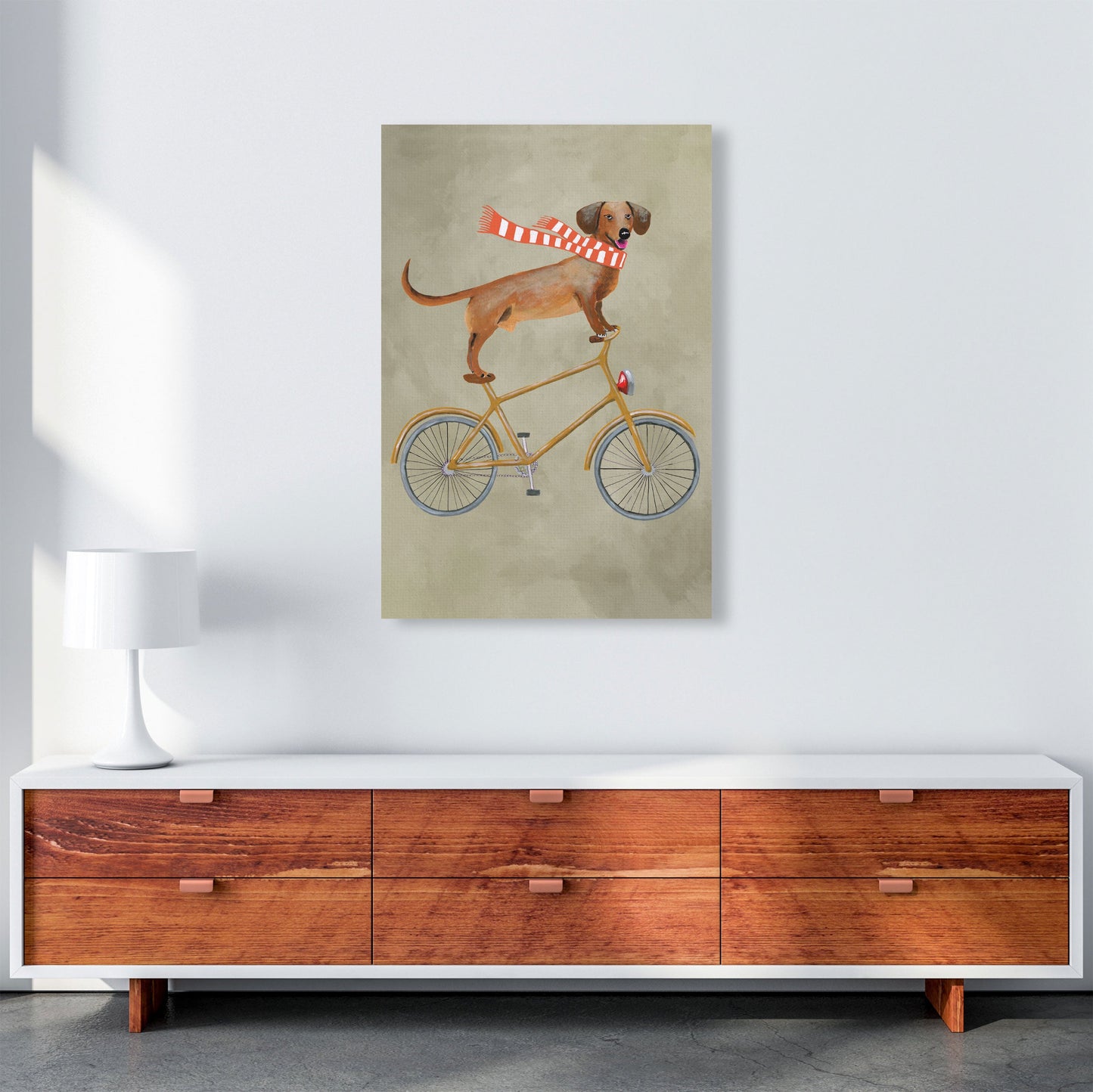 Rynx | Dachshund On Bicycle In Winter Art Print by Coco Deparis