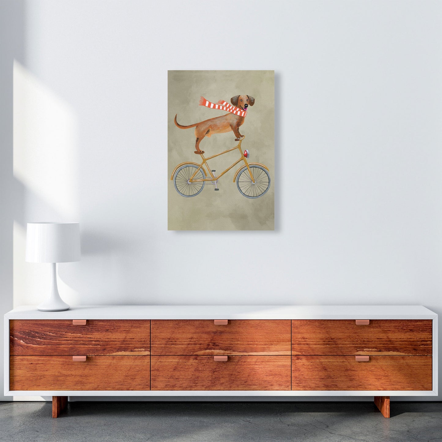 Rynx | Dachshund On Bicycle In Winter Art Print by Coco Deparis
