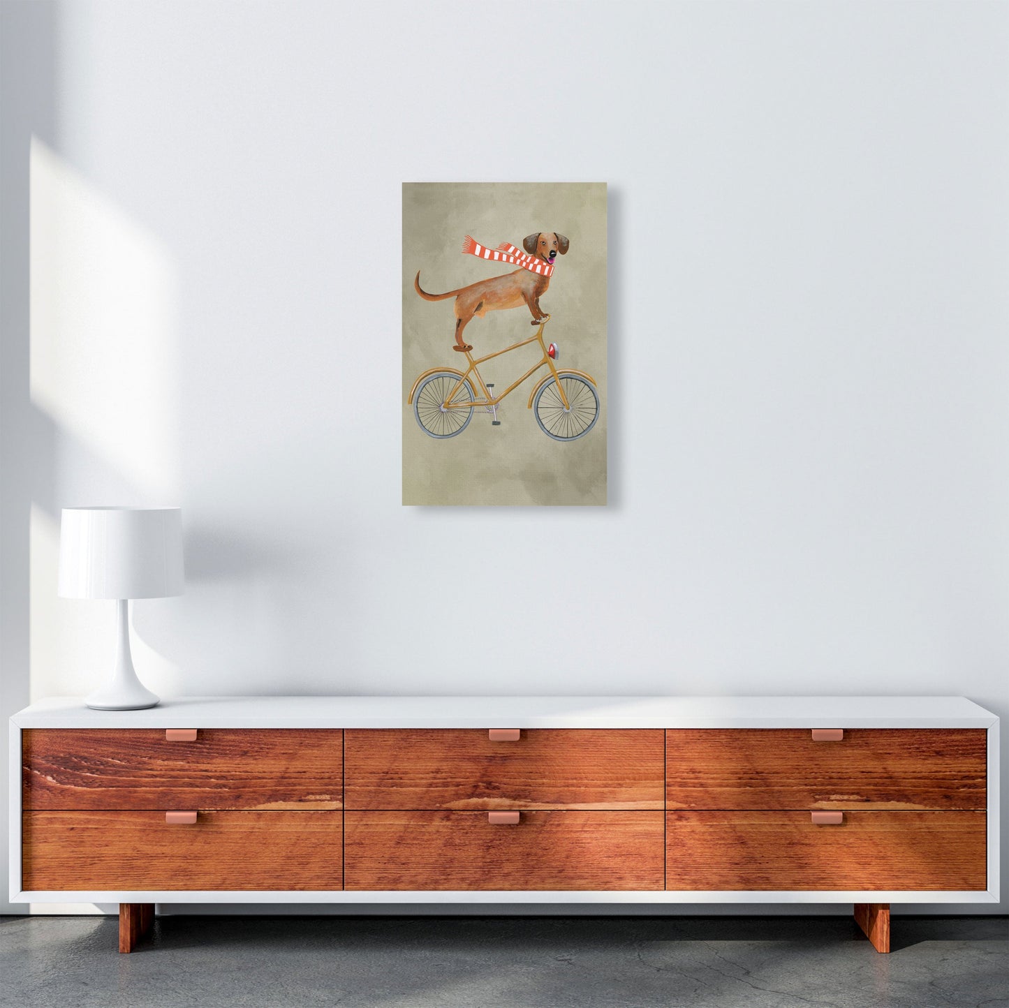 Rynx | Dachshund On Bicycle In Winter Art Print by Coco Deparis