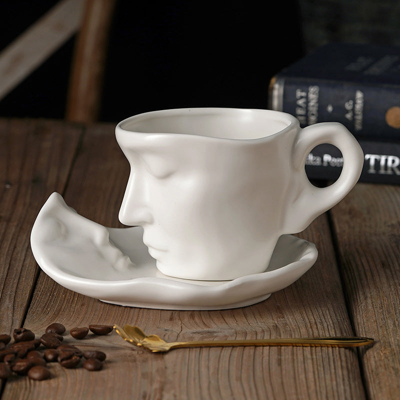 Rynx | Metal touching face, creative ceramic kiss coffee mug