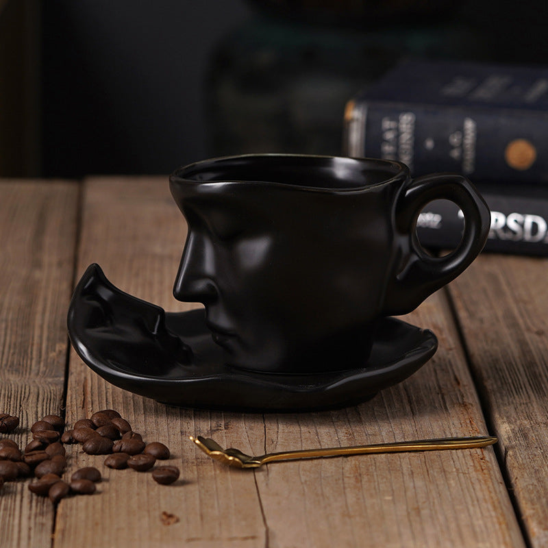 Rynx | Metal touching face, creative ceramic kiss coffee mug