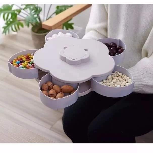 Rynx | Plum-shaped rotating fruit bowl