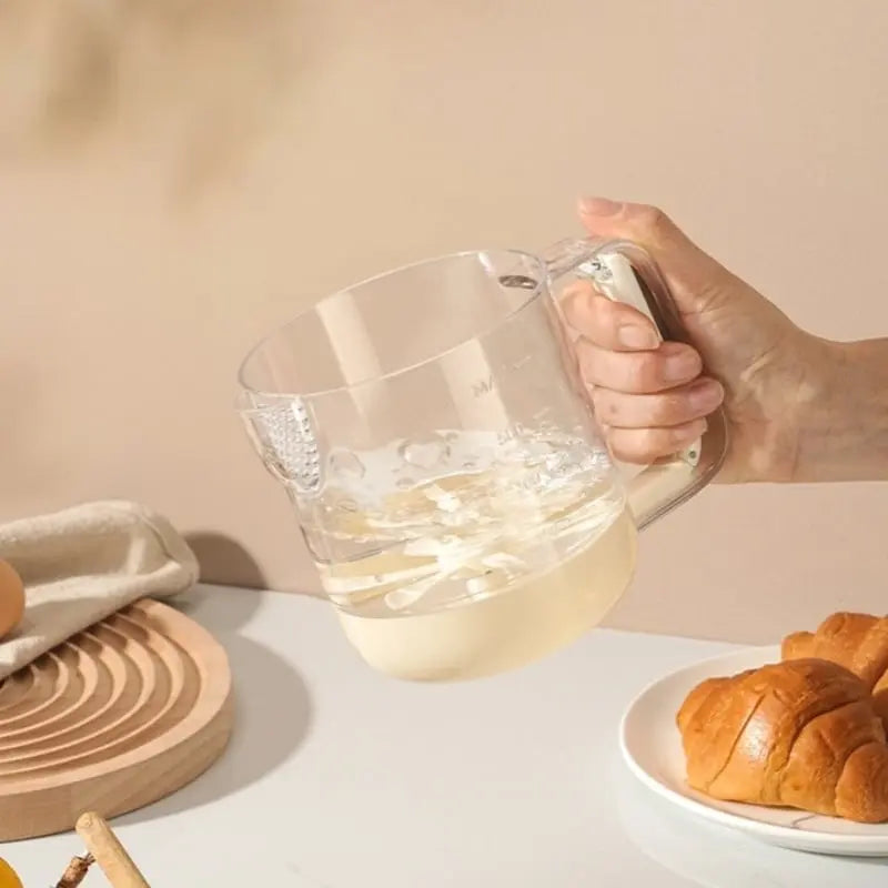 Rynx | Multifunctional Mixing Cup for Eggs – Manual Press with Measuring & Filtering Function