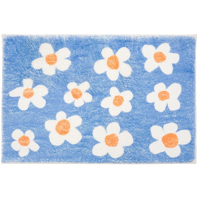 Rynx | White flowers on blue background bath mat
