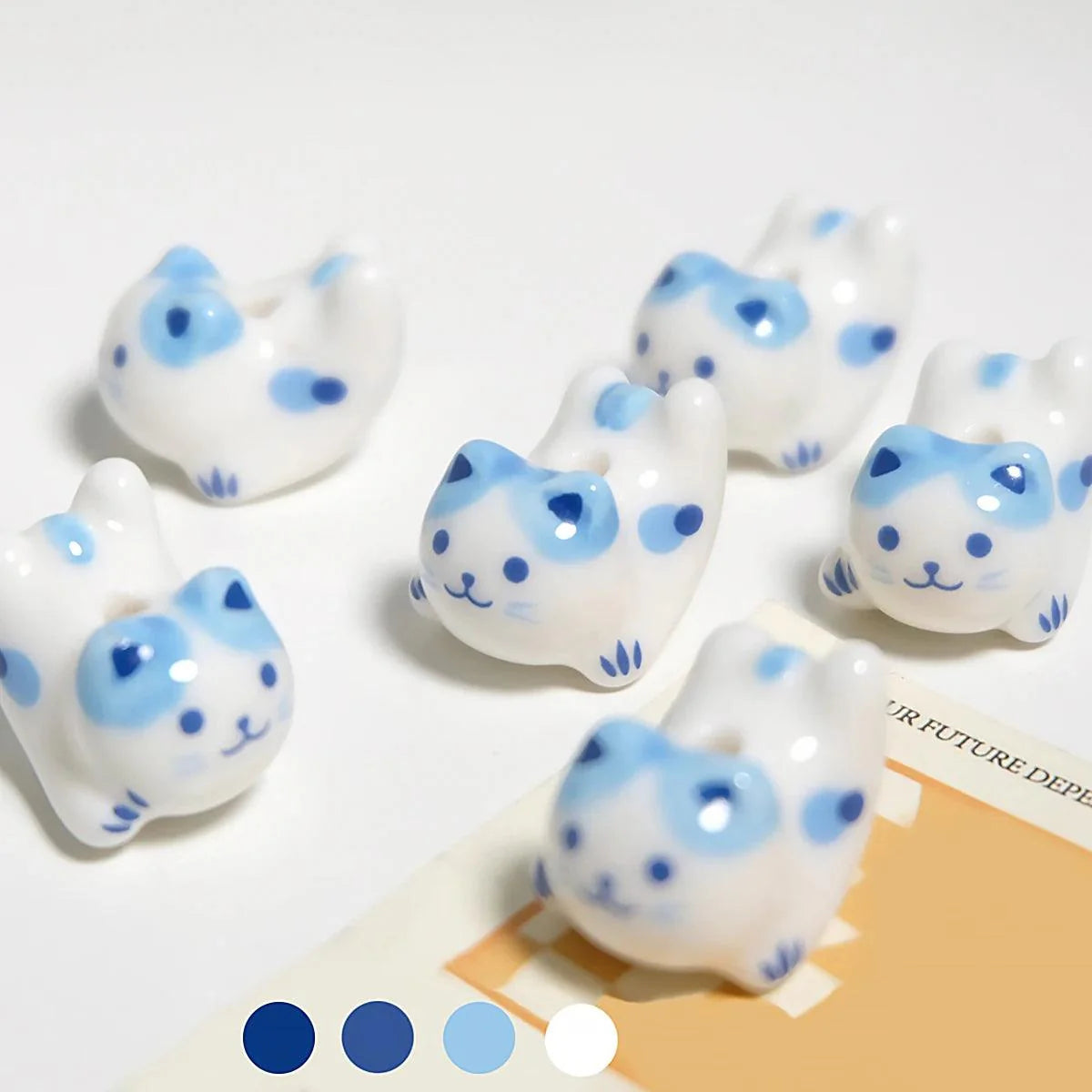 Rynx | Charming anime-inspired lucky cat ceramic beads for creative jewelry projects - 15x21mm porcelain essentials with vertical hole