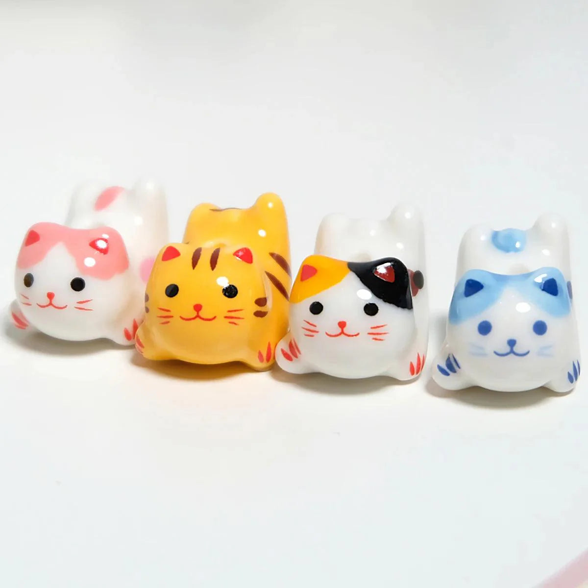 Rynx | Charming anime-inspired lucky cat ceramic beads for creative jewelry projects - 15x21mm porcelain essentials with vertical hole