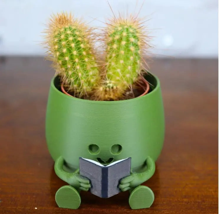 Rynx | Self-watering Flower Pot – Cute face with flexible legs!
