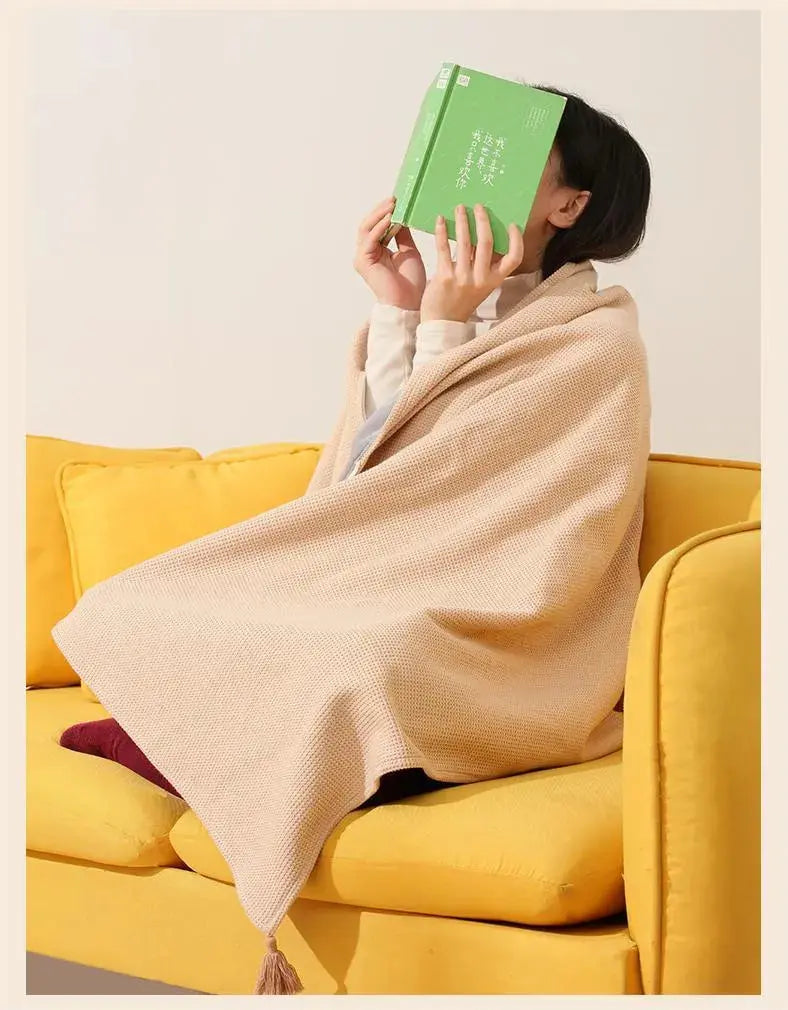 Rynx | Portable heating scarf – warmth on the go