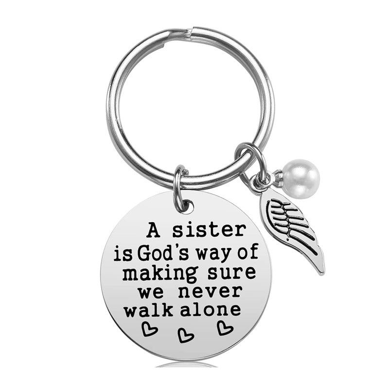 Rynx | A sister is God's way of ensuring that we never walk alone keychain