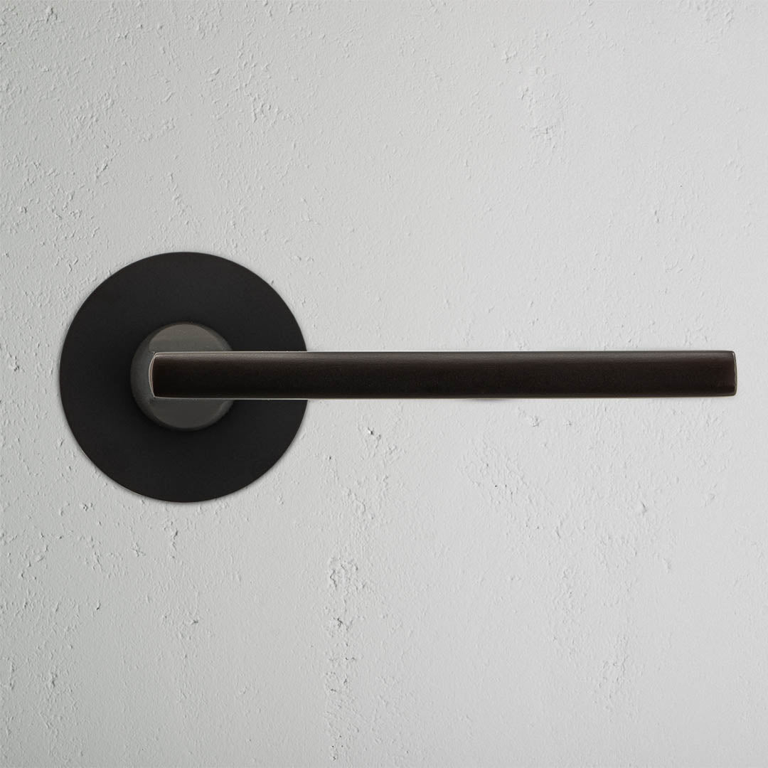 Rynx | Clayton Flush Rose Sprung Door Handle - Bronze