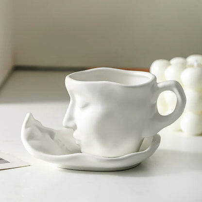 Rynx | Metal touching face, creative ceramic kiss coffee mug