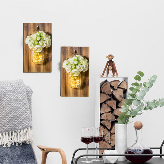 Rynx | Modern white rose string lamp with clear glass container and wooden back panel