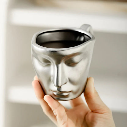 Rynx | Metal touching face, creative ceramic kiss coffee mug