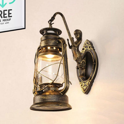 Rynx | One Bulb Wall Lamp with Lantern Shade Clear Glass Coast Bedroom Wall Lamp in Black/Antique Brass/Aged Copper with Mermaid