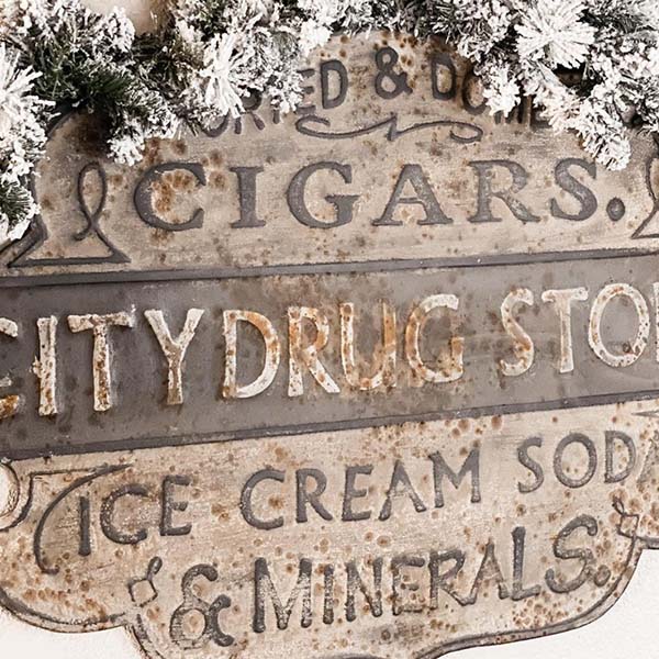 Rynx | Embossed Metal Drugstore Sign