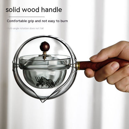 Rynx | Rotary-glass-teapot with infuser.