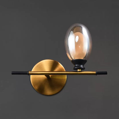 Rynx | Brass straight bar wall light Mid Century 1 head metal wall light ideas with dual oval clear/amber glass shade