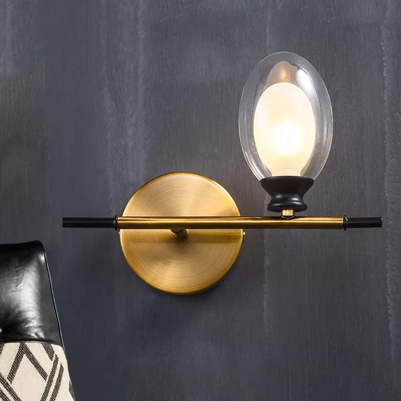 Rynx | Brass straight bar wall light Mid Century 1 head metal wall light ideas with dual oval clear/amber glass shade