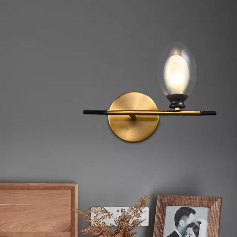 Rynx | Brass straight bar wall light Mid Century 1 head metal wall light ideas with dual oval clear/amber glass shade