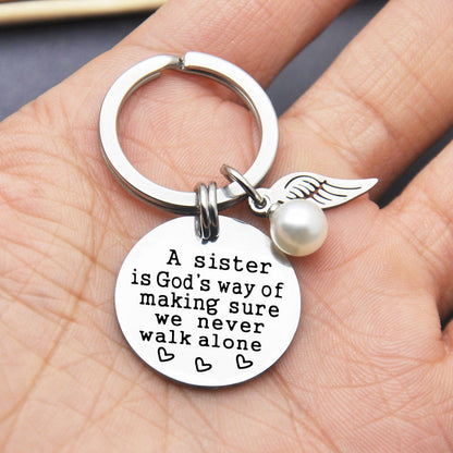 Rynx | A sister is God's way of ensuring that we never walk alone keychain
