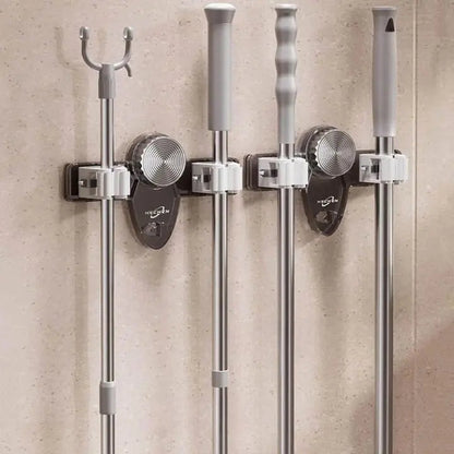 Rynx | Strong broom holder without drilling – Space-saving & safe storage 1+1 Free Gray