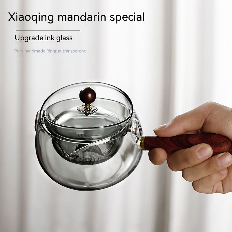 Rynx | Rotary-glass-teapot with infuser.