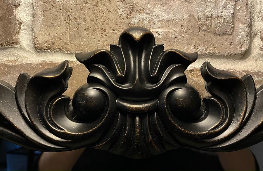 Rynx | Ornate black mirror with carved border