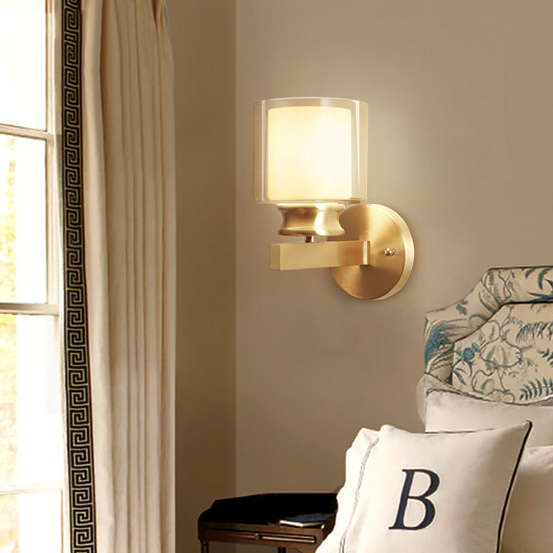 Rynx | Modern Style Cylindrical Wall Light 1 Light Clear and White Glass Wall Mount Lamp in Brass for Bedroom