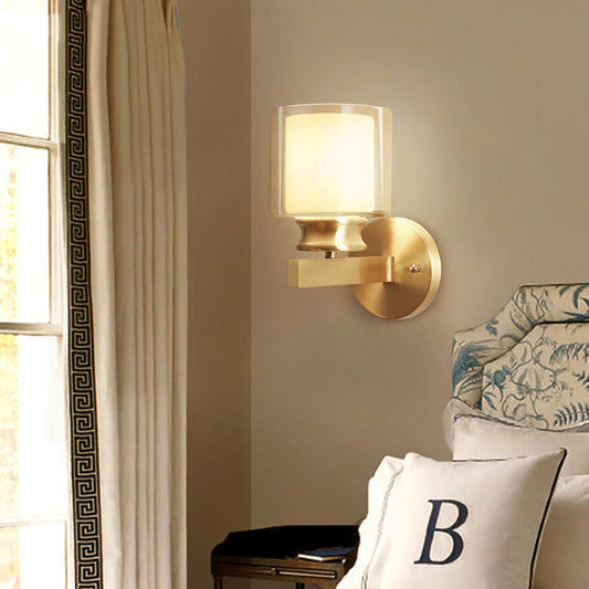 Rynx | Modern Style Cylindrical Wall Light 1 Light Clear and White Glass Wall Mount Lamp in Brass for Bedroom