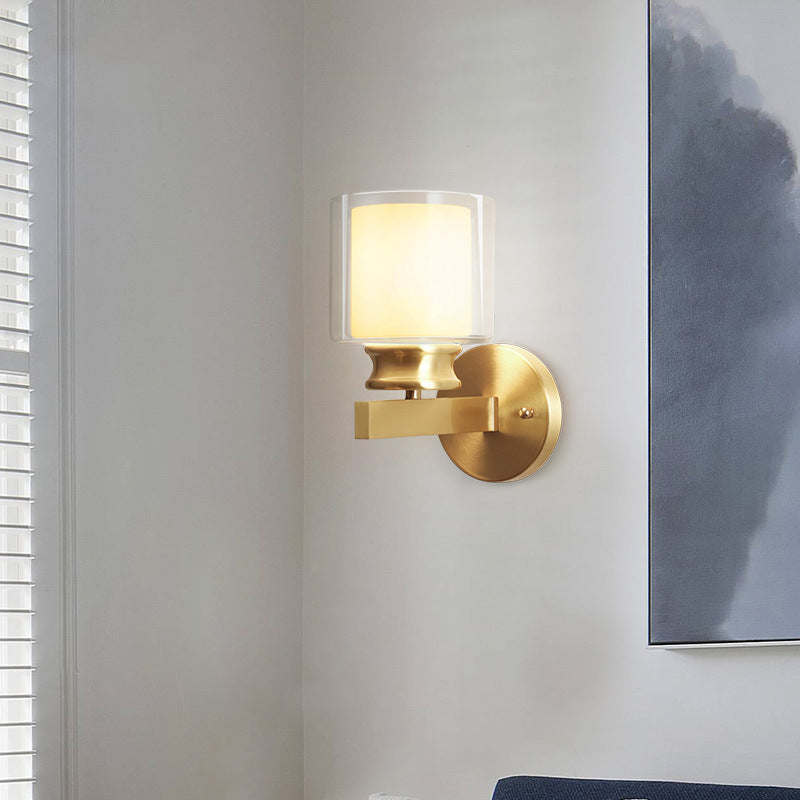 Rynx | Modern Style Cylindrical Wall Light 1 Light Clear and White Glass Wall Mount Lamp in Brass for Bedroom