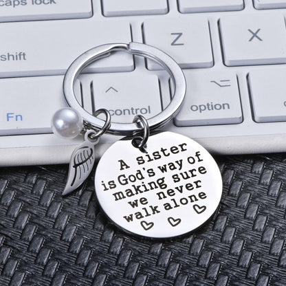 Rynx | A sister is God's way of ensuring that we never walk alone keychain