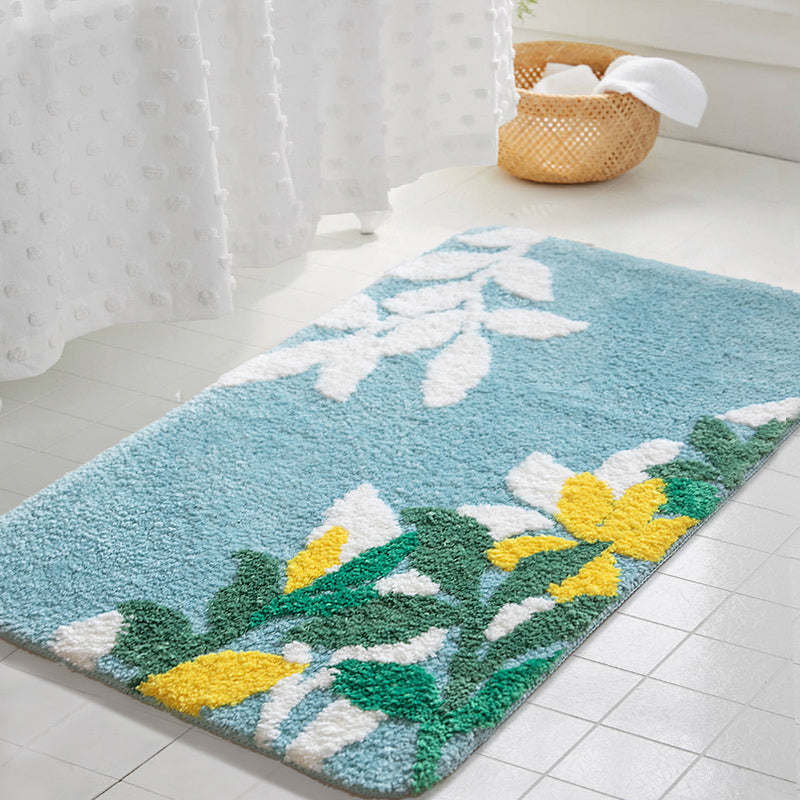Rynx | Yellow flower and green leaves bathroom mat