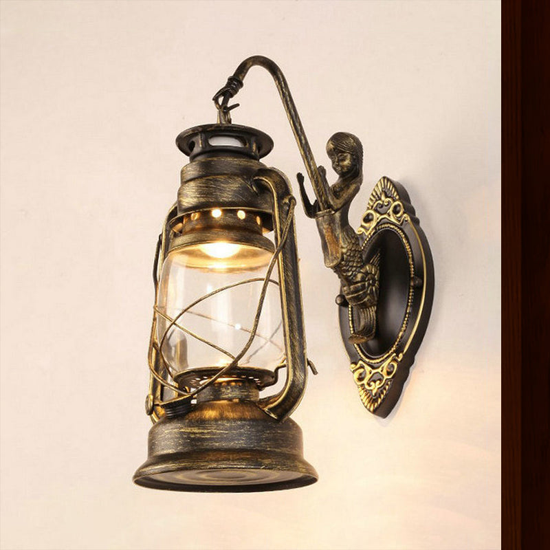 Rynx | One Bulb Wall Lamp with Lantern Shade Clear Glass Coast Bedroom Wall Lamp in Black/Antique Brass/Aged Copper with Mermaid