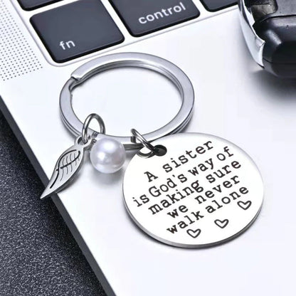 Rynx | A sister is God's way of ensuring that we never walk alone keychain