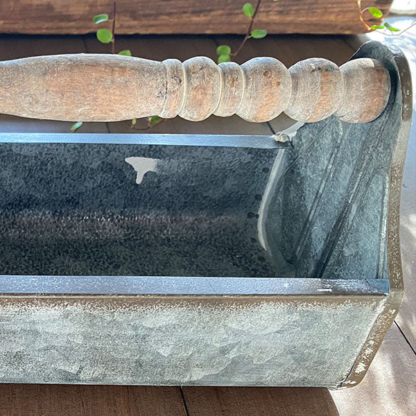 Rynx | Rusty patina galvanized metal caddy with wooden spool handle
