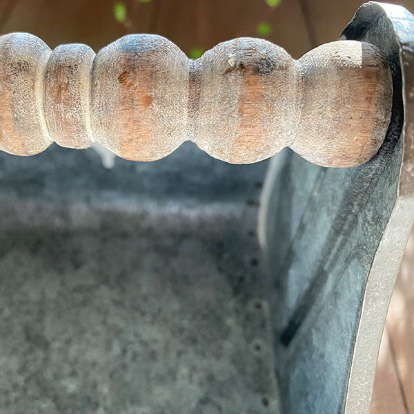 Rynx | Rusty patina galvanized metal caddy with wooden spool handle