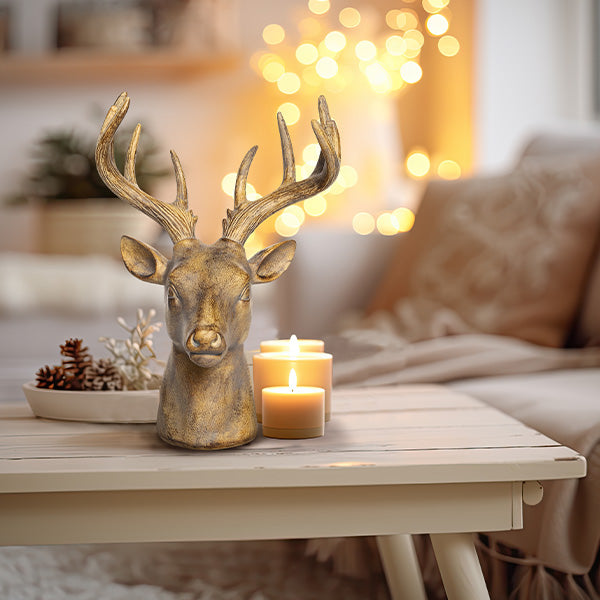 Rynx | Antique gold deer head symbol