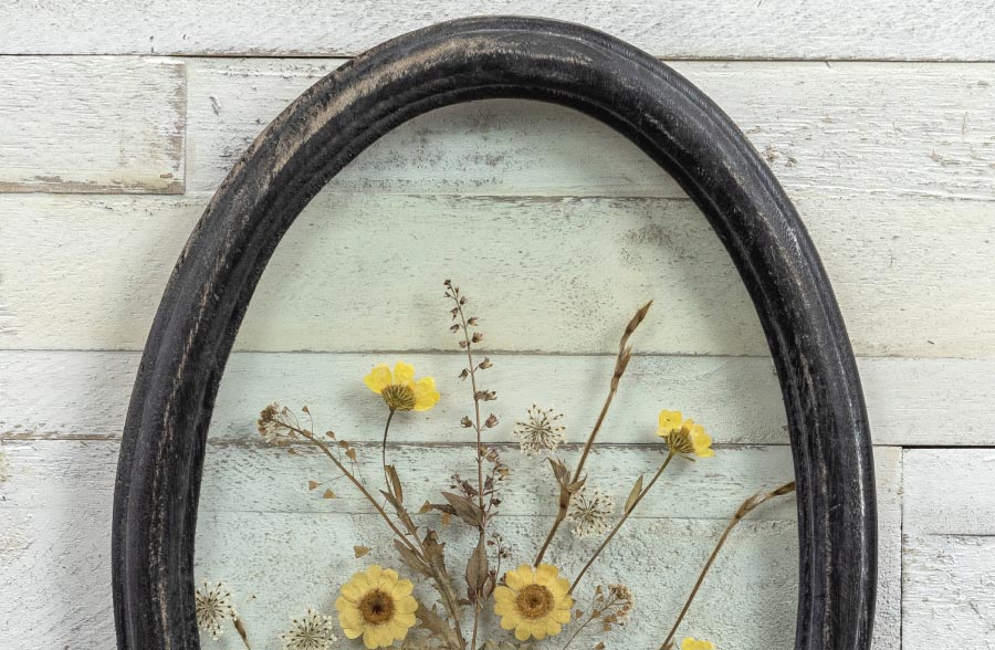 Rynx | Black oval framed pressed botanicals