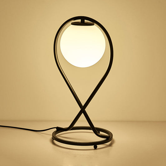 Rynx | Crosstique – modern linear bedside light made of iron
