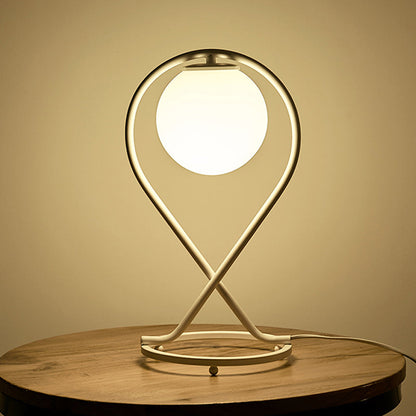 Rynx | Crosstique – modern linear bedside light made of iron