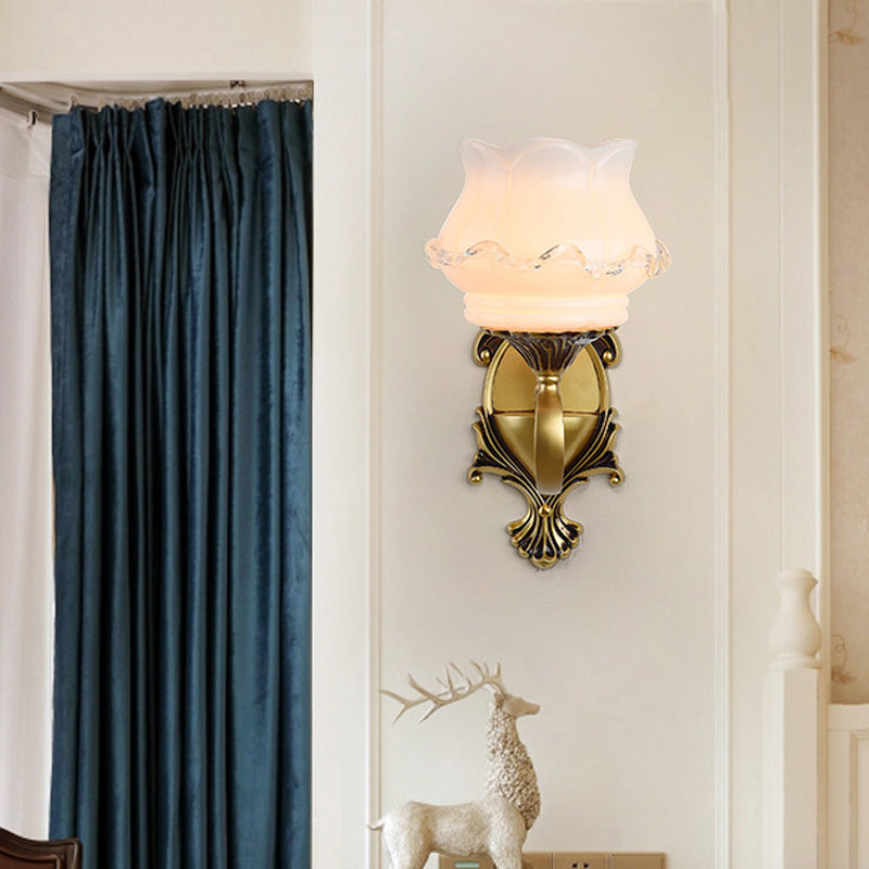 Rynx | Vintage Curved Arm Wall Lighting Idea 1/2-Ball Metal Wall Lamp in Brass with Floral Milk Glass Shade