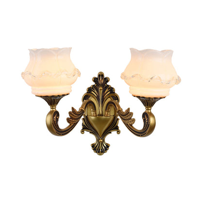 Rynx | Vintage Curved Arm Wall Lighting Idea 1/2-Ball Metal Wall Lamp in Brass with Floral Milk Glass Shade