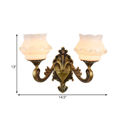 Rynx | Vintage Curved Arm Wall Lighting Idea 1/2-Ball Metal Wall Lamp in Brass with Floral Milk Glass Shade